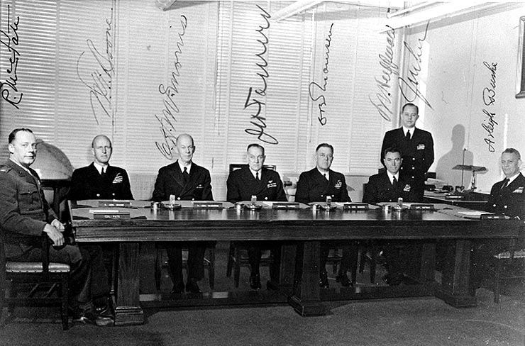 The General Board of the U.S. Navy in November, 1947. From left to right: Colonel Randolph M. Pate; Admiral Walter F. Boone; Admiral Charles H. McMorris; Admiral John H. Towers; Rear Admiral Charles B. Momsen; Captain Leon J. Huffman; Commander J.M Lee; Captain Arleigh A. Burke (USN Photo/Wikimedia Commons)