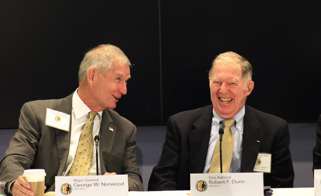 Major General George W. "Nordie" Norwood, USAF (Ret.) and Vice Admiral Robert F. Dunn, USN (Ret.) share some lighthearted laughs during the opening plenary session on Thursday morning (Photo by Matthew Eng/NHF/Released)