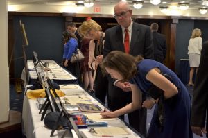 Guests bid during the silent auction (Photo courtesy Joe Rudinec/Rudinec and Associates/Released)